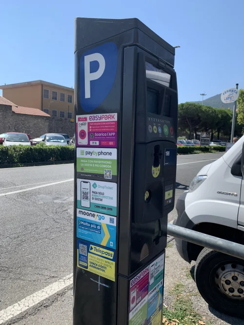 Typical parking meter & list of accepted parking apps