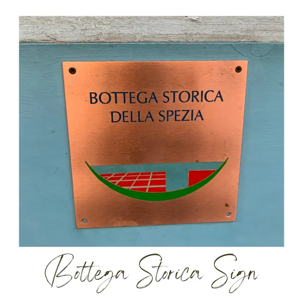 Plaque designating historical shops and businesses of La Spezia