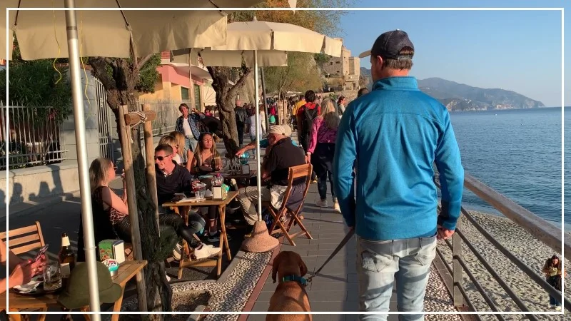 Monterosso in Low Season still busy with people enjoying lunch and a view